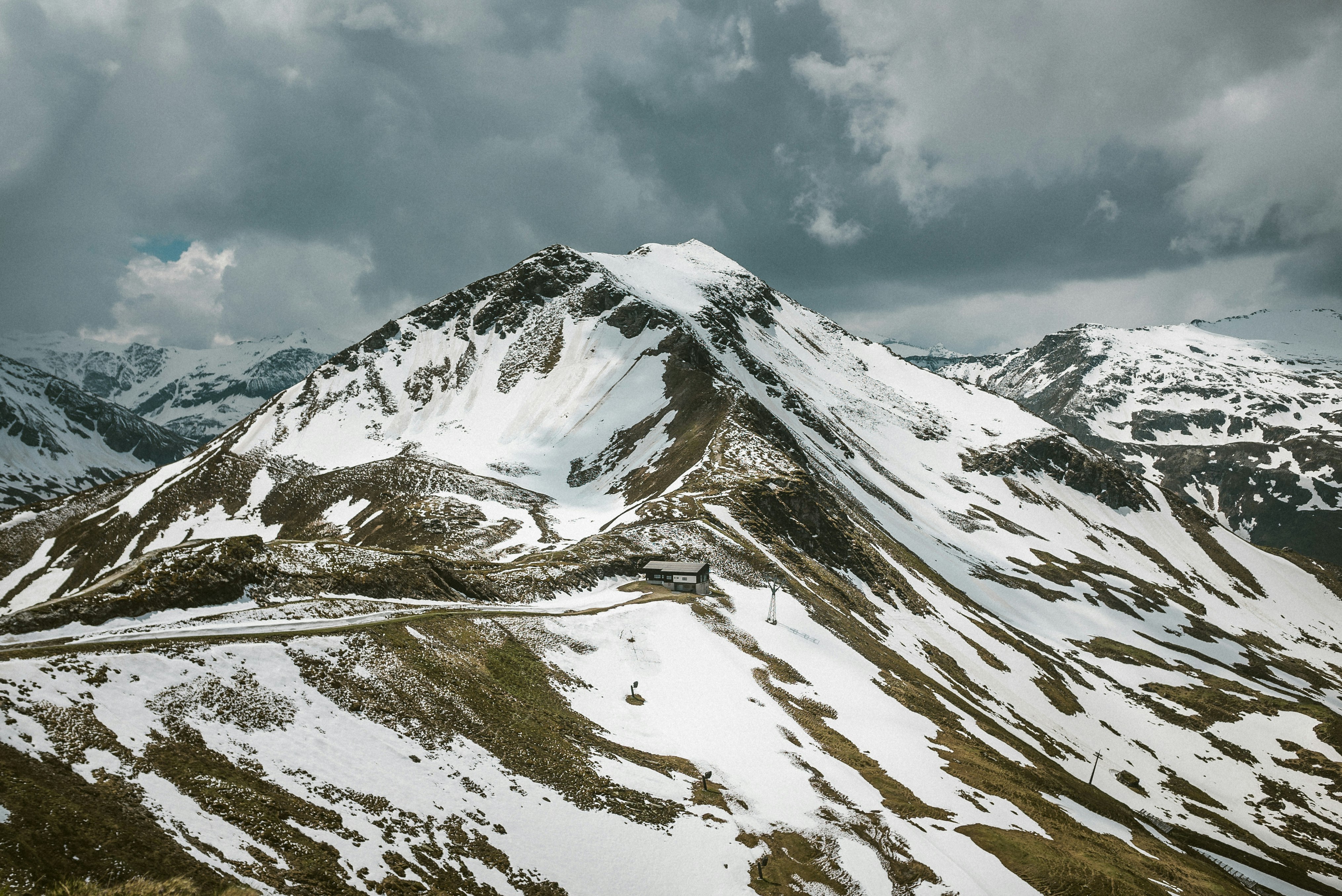 snow covered mountain under blue sky during daytime